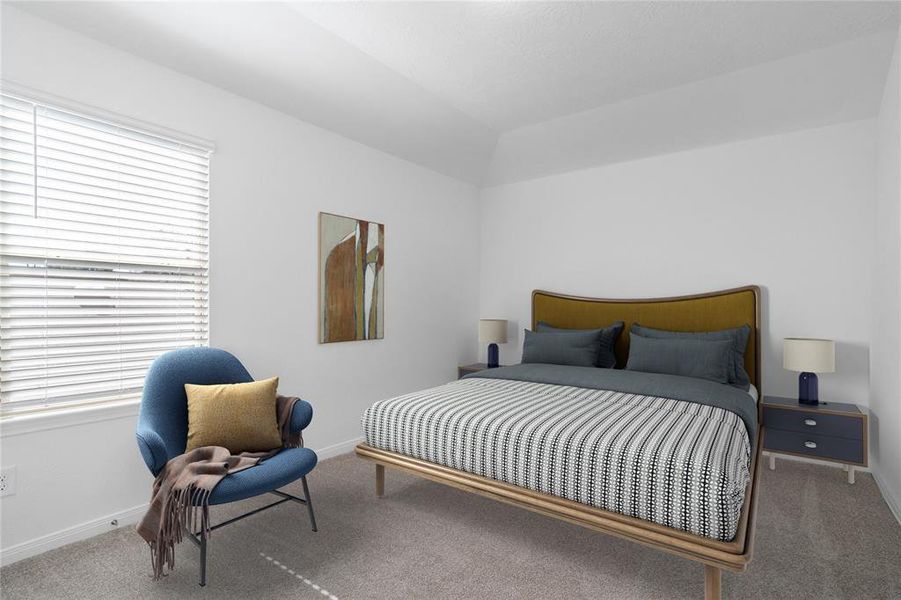 Secondary bedroom features plush carpet, custom paint, ample closet space and a large window with privacy blinds.