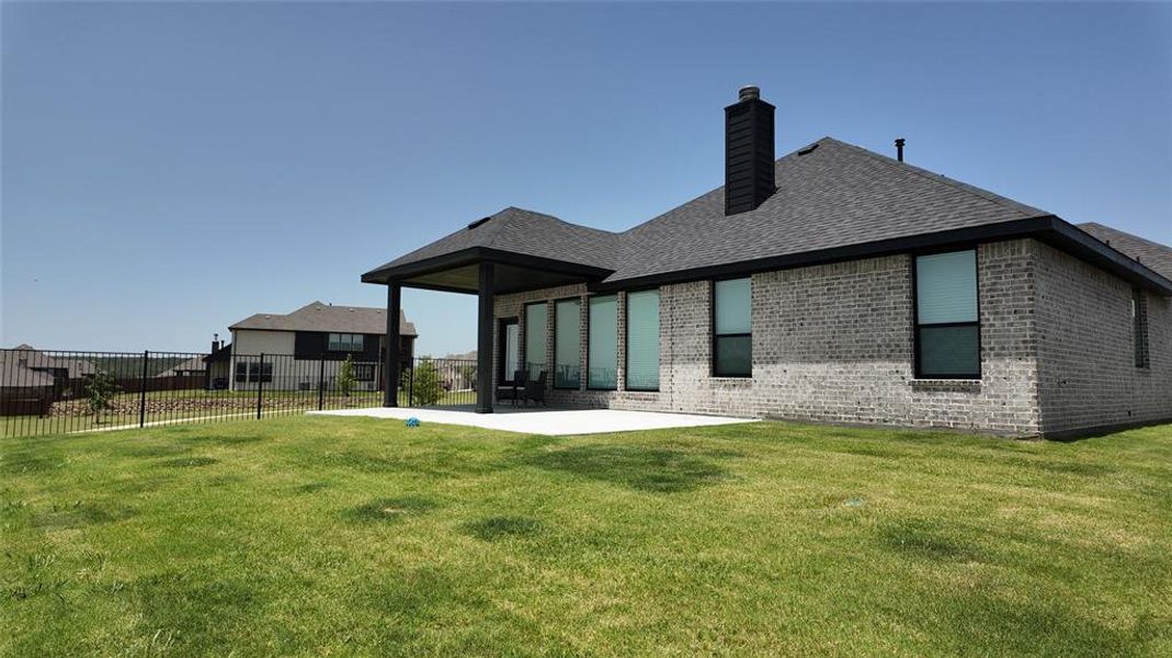 Exterior details and patio area of a home in Panchasarp Farms, Burleson (Image 26). Exterior details and patio area of a home in Panchasarp Farms, Burleson (Image 26).