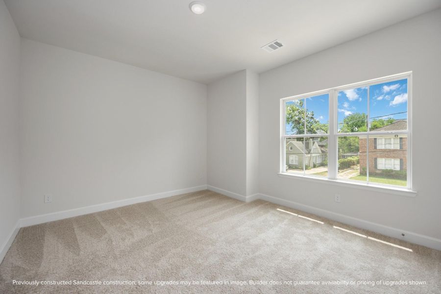 Discover custom shelving in the closet of this second-floor bedroom, sharing a hall bathroom, where practicality meets personalized storage solutions. Discover custom shelving in the closet of this second-floor bedroom, sharing a hall bathroom, where practicality meets personalized storage solutions.