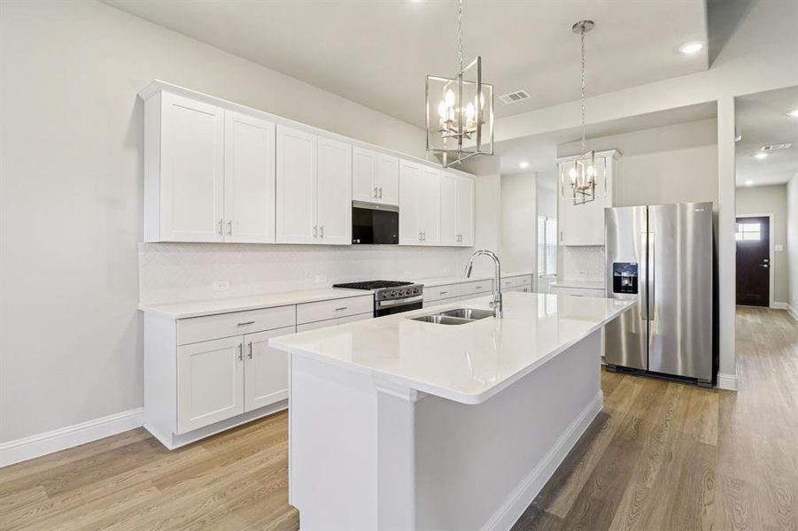 Photo is not of the actual home, but is an inspirational photo of builder’s model home and may depict options, furnishings, and/or decorator features that are not included.