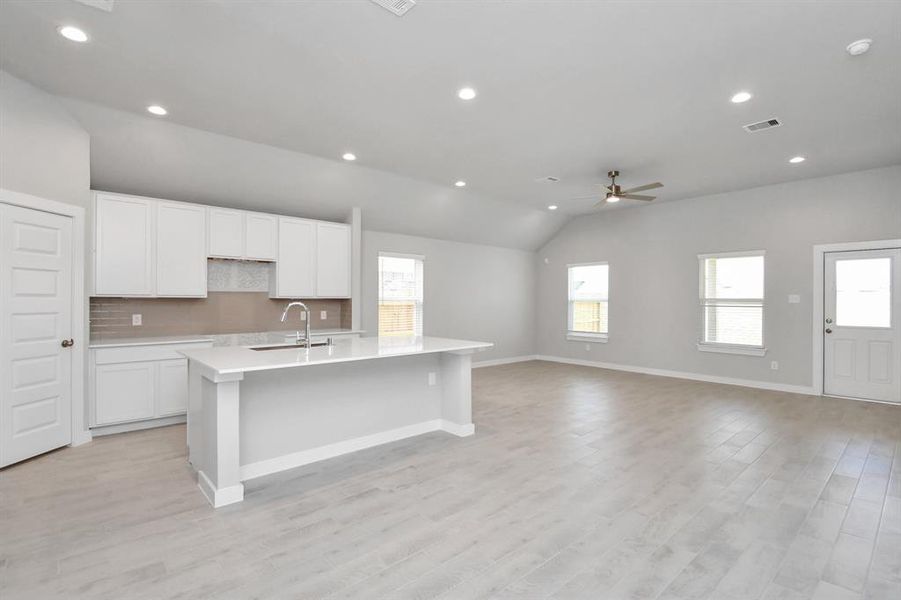 This generously spacious kitchen is a dream realized! Sample photo of similar plan. As-built color and selections may vary.