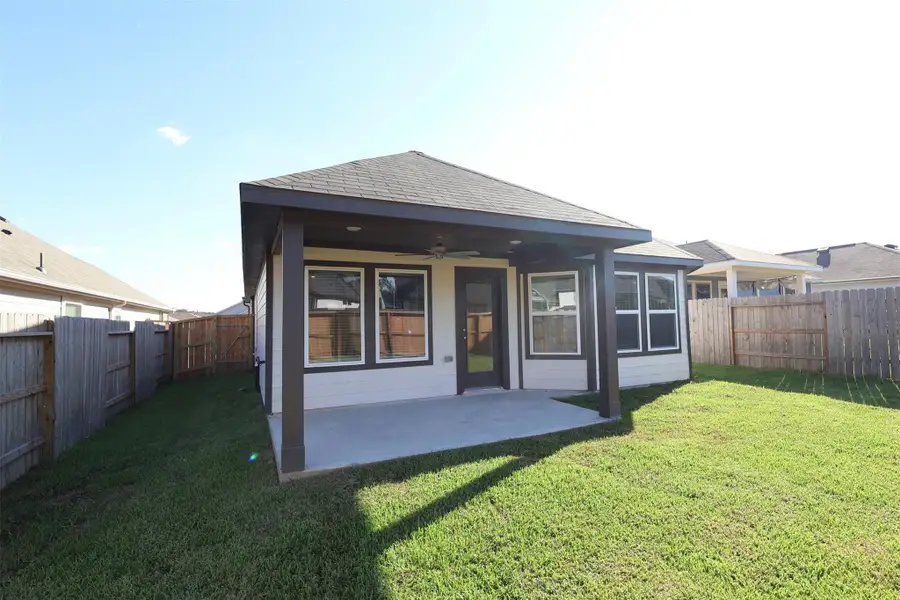 Exterior details and patio area of a home in Magnolia Ridge, Magnolia (Image 3). Exterior details and patio area of a home in Magnolia Ridge, Magnolia (Image 3).