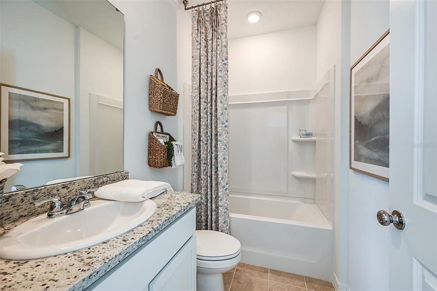 Furnished interior view inside a new home in Westview Community Group Page, Kissimmee (Image 11).