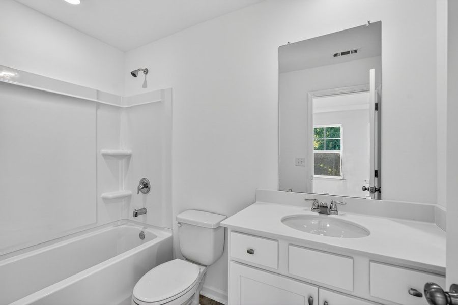 Furnished interior view inside a new home in Chandler Run, Tucker (Image 12).
