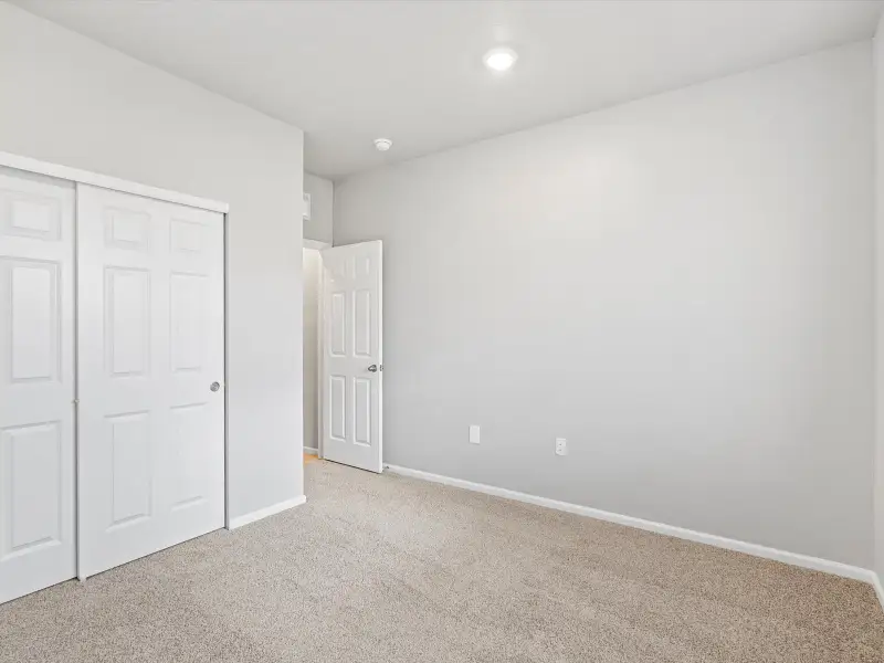 Spacious, unfurnished interior of a new home in Poudre Heights: The Alpine Collection, Windsor (Image 12).