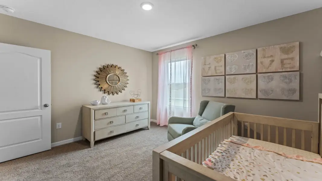 Furnished interior view inside a new home in Coral Bay - Express & Tradition, North Fort Myers (Image 13).