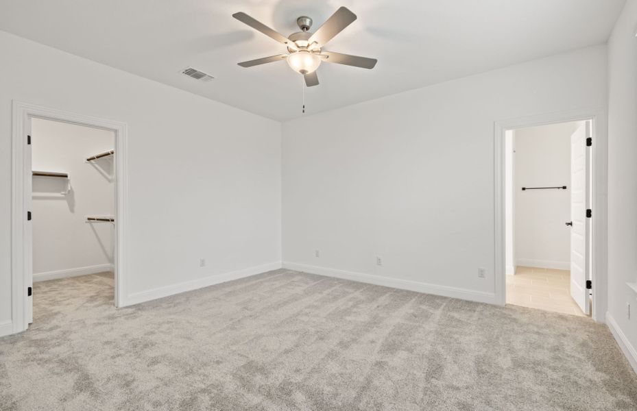 Representative unfurnished interior of a home built from the Burnet by Pulte Homes in Crosswinds, Kyle (Image 17).