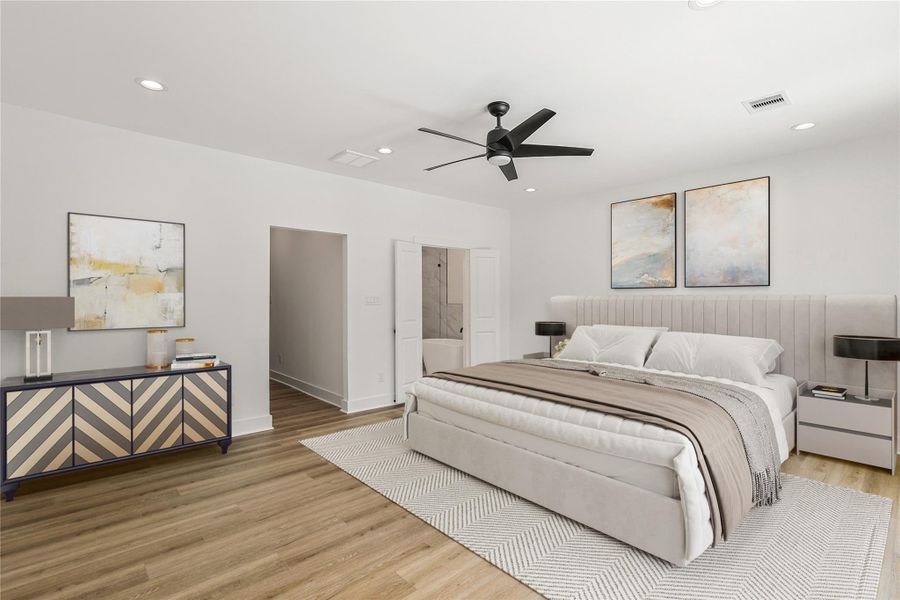 Another view of the expansive primary suite, offering a glimpse of the elegant ensuite bathroom and the private hallway entry that adds a sense of separation and retreat. A beautifully designed space that blends comfort, privacy, and luxury, truly a must-see. Photo is virtually staged.