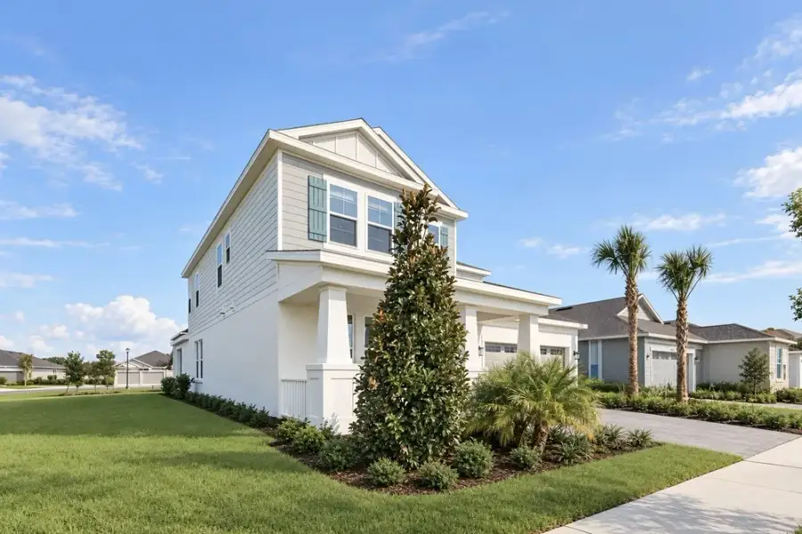 Front exterior of a new home in Center Lake Ranch Community Group Page, St. Cloud, FL, highlighting curb appeal (Image 24).