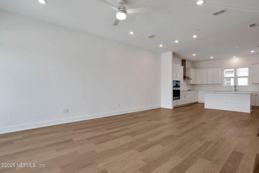Spacious, unfurnished interior of a new home in North Beach Townhomes, Jacksonville Beach (Image 24).