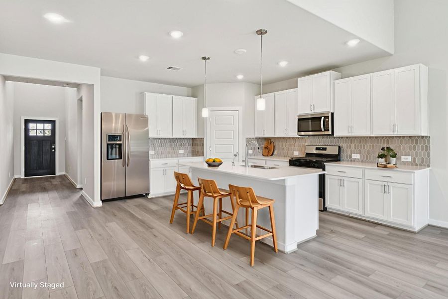 Furnished interior view inside a new home in Pine Lake Cove - Classic Series, Montgomery (Image 5).