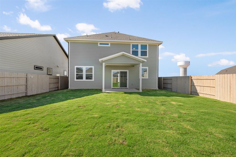 Exterior details and patio area of a home in The Colony 45s, Bastrop (Image 3).