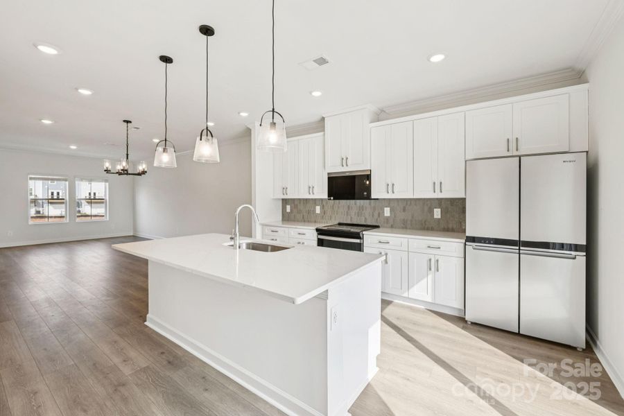 Photo is not of the actual home, but is an inspirational photo of builder’s model home and may depict options, furnishings, and/or decorator features that are not included Photo is not of the actual home, but is an inspirational photo of builder’s model home and may depict options, furnishings, and/or decorator features that are not included