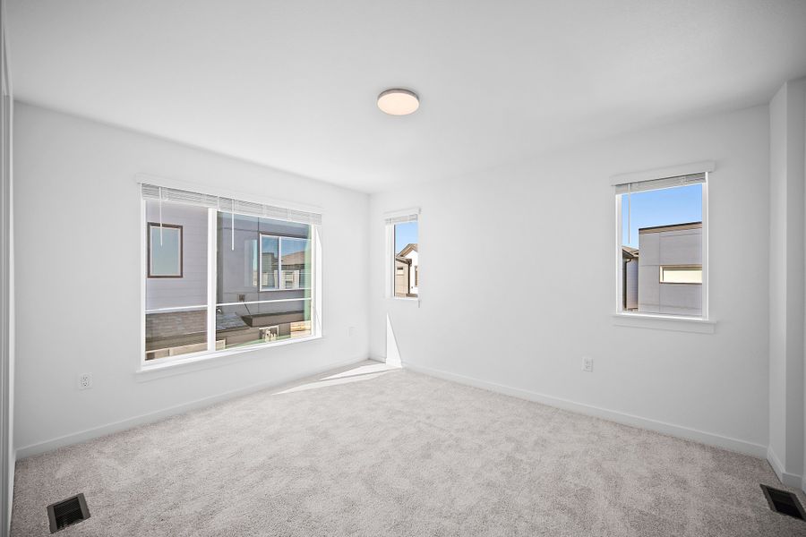 Spacious, unfurnished interior of a new home in Lyric at RidgeGate Townhomes, Lone Tree (Image 20).