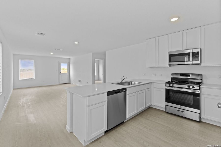 Furnished interior view inside a new home in Spring Grove, St. Hedwig (Image 9).