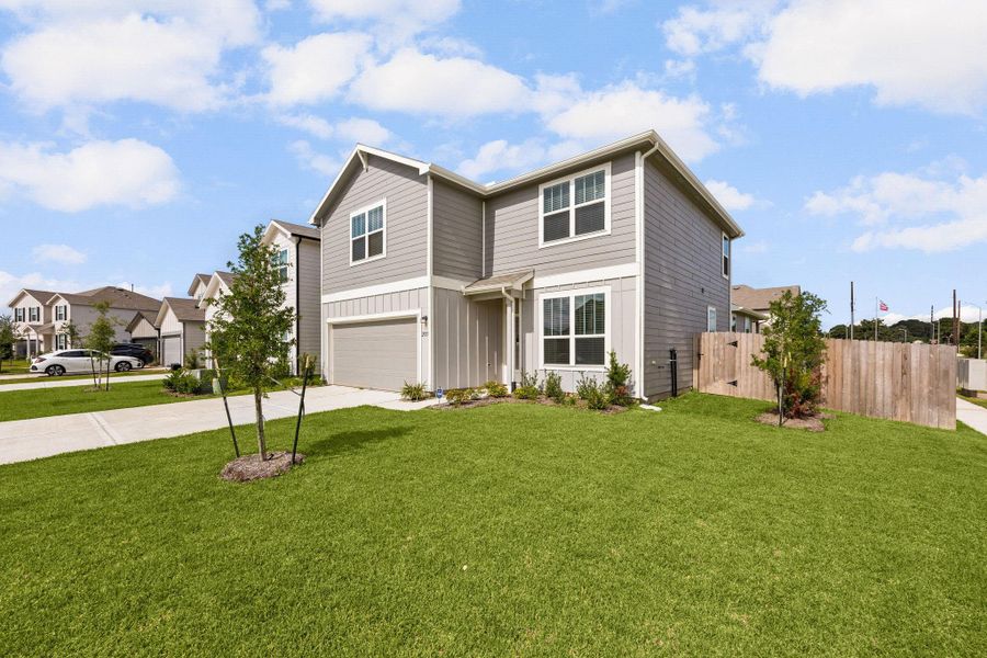 The oversized side yard provides additional outdoor space for pets, play, entertaining, or future backyard enjoyment. The full sprinkler system helps keep the lawn looking its best year-round.