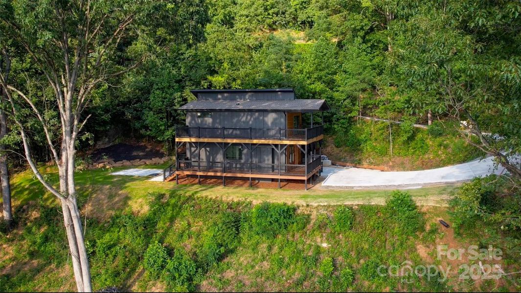 Front exterior of a new home in , Canton, NC, highlighting curb appeal (Image 14). Front exterior of a new home in , Canton, NC, highlighting curb appeal (Image 14).