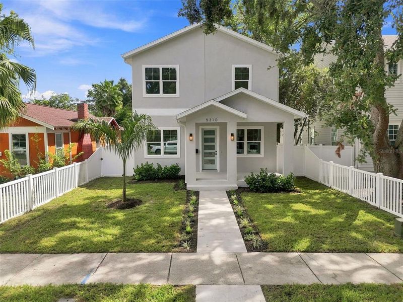 Front exterior of a new home in , St. Petersburg, FL, highlighting curb appeal (Image 33). Front exterior of a new home in , St. Petersburg, FL, highlighting curb appeal (Image 33).