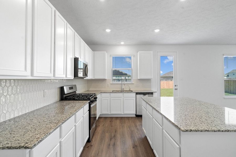 Furnished interior view inside a new home in Sunset Grove South, Hitchcock (Image 4). Furnished interior view inside a new home in Sunset Grove South, Hitchcock (Image 4).