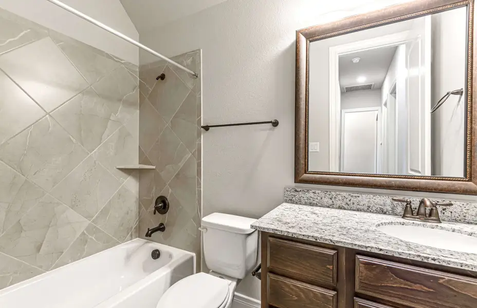 Representative furnished interior of a home built from the 3616 by Ravenna Homes in Artavia 70′, Conroe (Image 16).