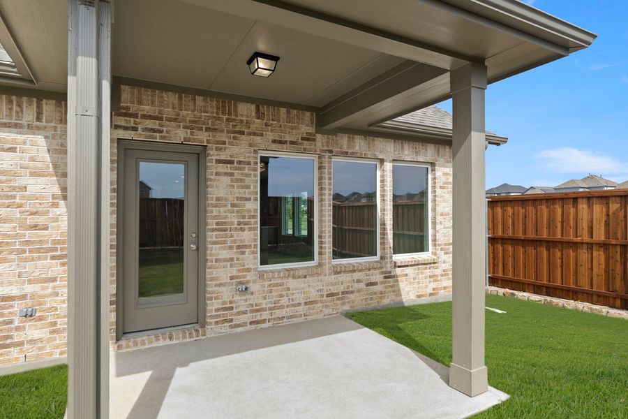 Exterior details and patio area of a home in Creekside, Royse City (Image 20).