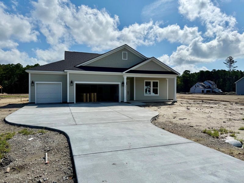 Front exterior of a new home in Pamlico Terrace, Awendaw, SC, highlighting curb appeal (Image 1).