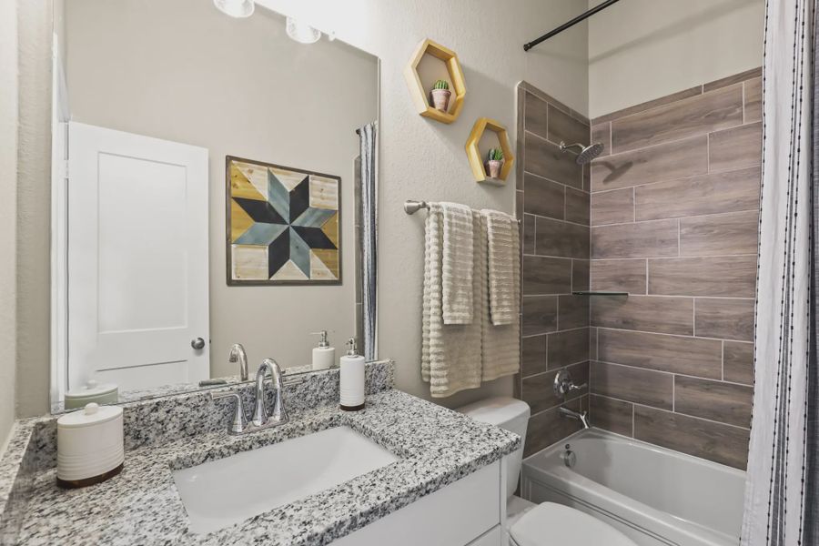 Representative furnished interior of a home built from the Oxford by Chesmar Homes in Newhaven, Manor (Image 16).