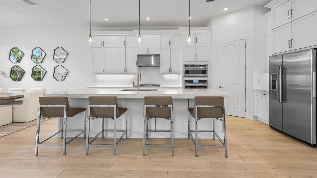 Furnished interior view inside a new home in L'Ambiance at Avenir, Palm Beach Gardens (Image 26).