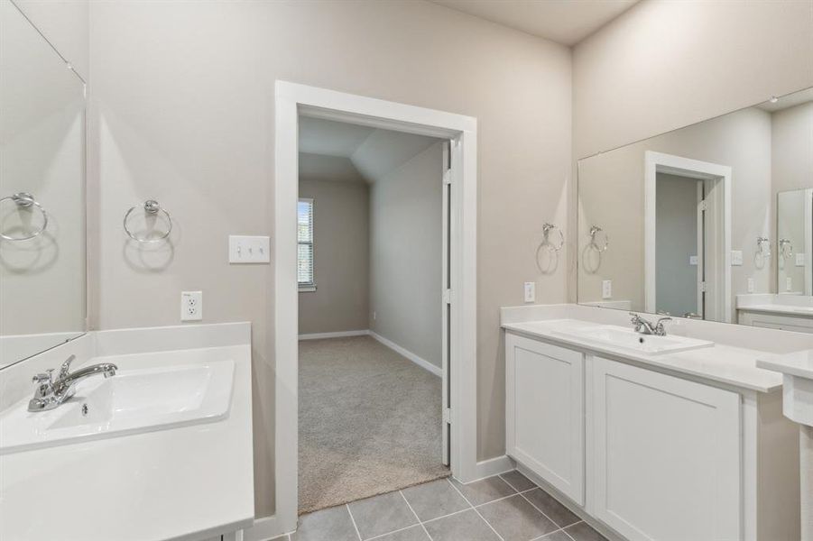 Primary bathroom in the Elm home plan by Trophy Signature Homes – REPRESENTATIVE PHOTO Primary bathroom in the Elm home plan by Trophy Signature Homes – REPRESENTATIVE PHOTO