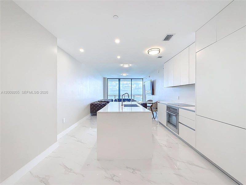 Furnished interior view inside a new home in , Miami (Image 12).