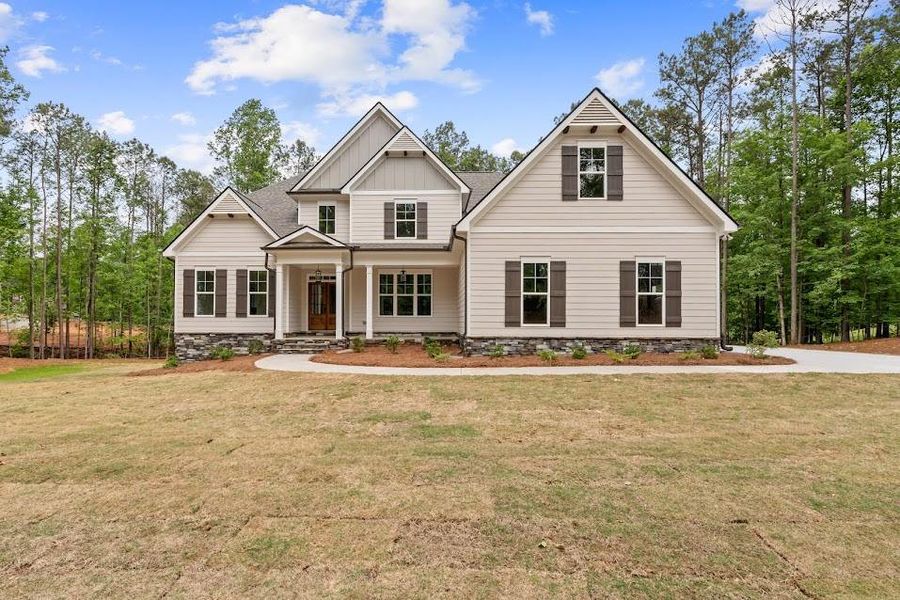 Front exterior of a new home in , Winston, GA, highlighting curb appeal (Image 24). Front exterior of a new home in , Winston, GA, highlighting curb appeal (Image 24).