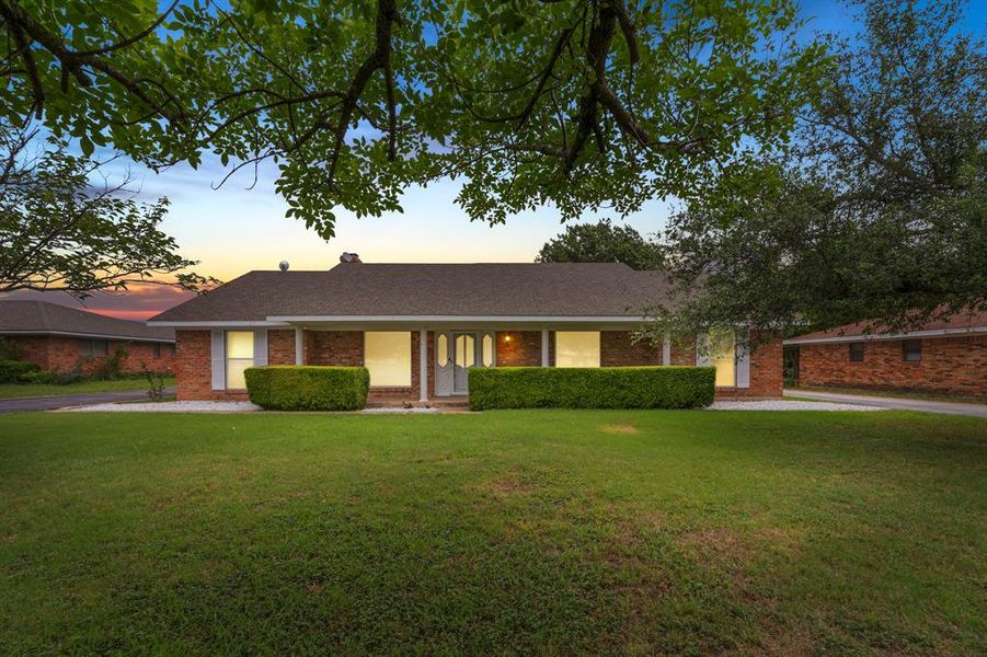 Front exterior of a new home in , Hillsboro, TX, highlighting curb appeal (Image 2). Front exterior of a new home in , Hillsboro, TX, highlighting curb appeal (Image 2).