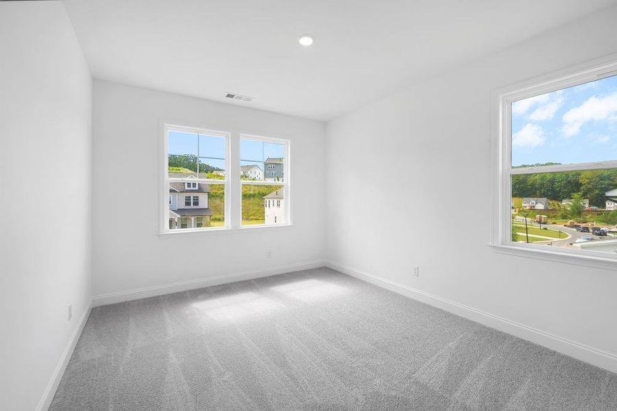 Spacious, unfurnished interior of a new home in Stratford Hills, Ball Ground (Image 28).