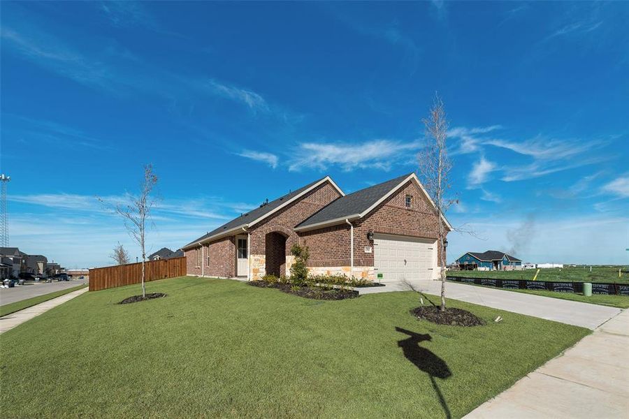 Front exterior of a new home in Walden Pond, Forney, TX, highlighting curb appeal (Image 19).