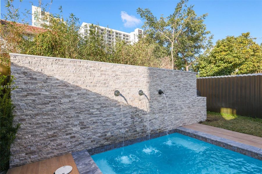 Exterior details and patio area of a home in , Miami (Image 26). Exterior details and patio area of a home in , Miami (Image 26).