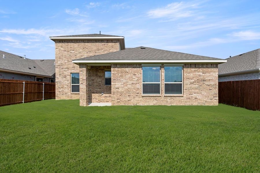 Front exterior of a new home in Northspur, Terrell, TX, highlighting curb appeal (Image 28). Front exterior of a new home in Northspur, Terrell, TX, highlighting curb appeal (Image 28).