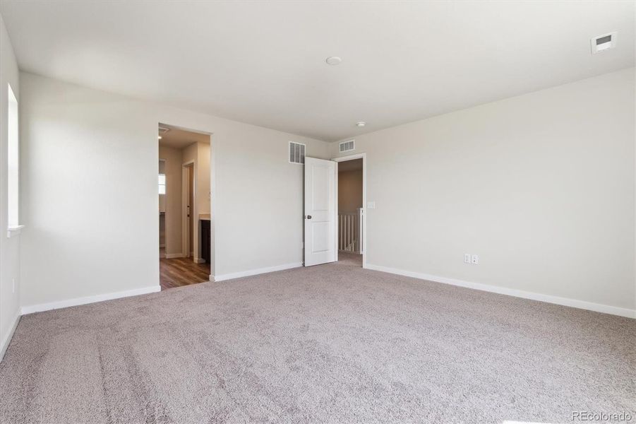 Spacious, unfurnished interior of a new home in Red Barn Meadows, Mead (Image 14).