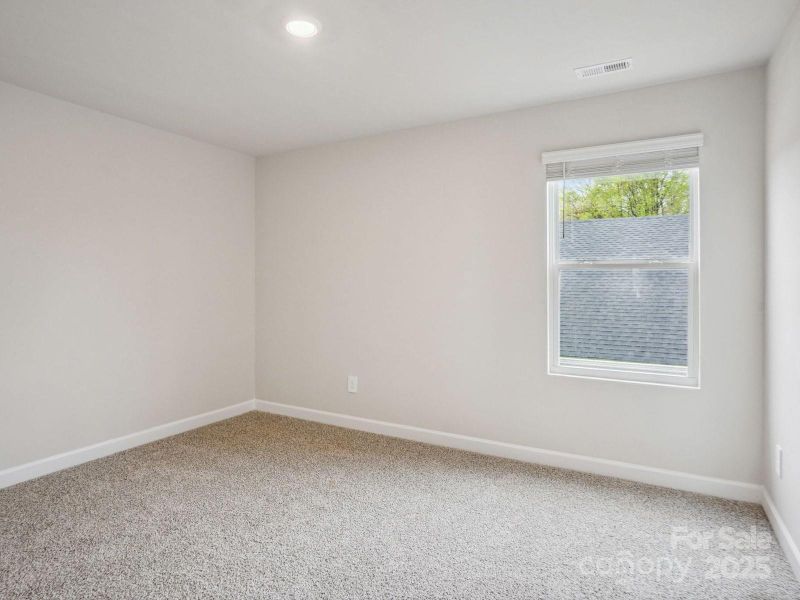 Photos are not of the actual home, but are photos of the builder home with same floorplan with similar interior finishes.