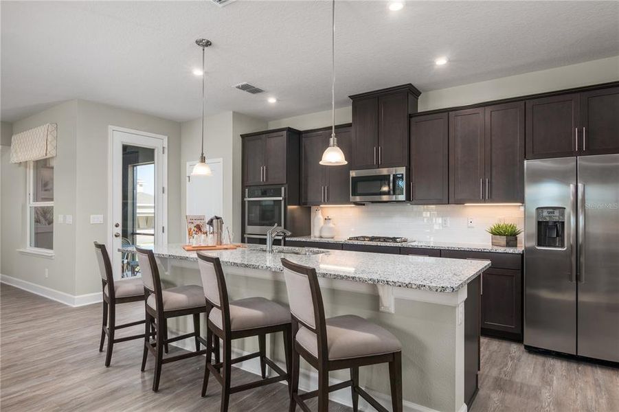 Furnished interior view inside a new home in Lake Mattie Preserve Estates, Auburndale (Image 2).