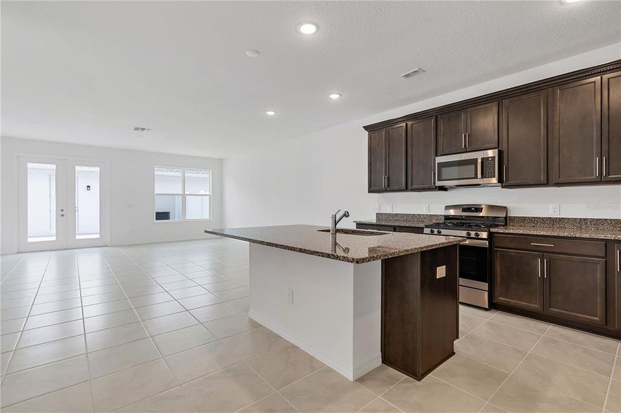 Furnished interior view inside a new home in Osprey Ranch Townhomes, Winter Garden (Image 10).