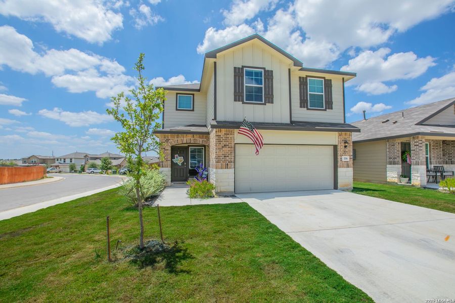 Front exterior of a new home in The Links at River Bend, Floresville, TX, highlighting curb appeal (Image 22).