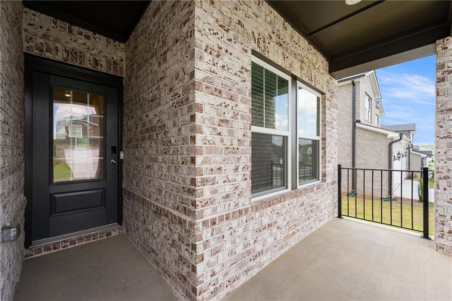 Exterior details and patio area of a home in Creekside at Oxford Park, Fairburn (Image 3).