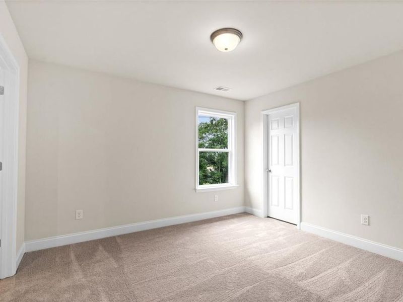 Spacious, unfurnished interior of a new home in Wehunt Meadows, Hoschton (Image 37).