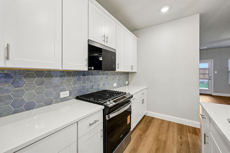 Furnished interior view inside a new home in Parks at Foster Crossing - Spring Series, Anna (Image 10).