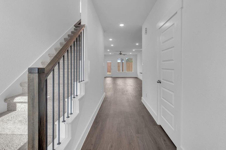 Entryway w/ Beautiful Open Railing Staircase Leading Upstairs