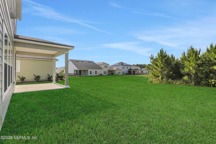 Exterior details and patio area of a home in Hyland Trail, Green Cove Springs (Image 28).