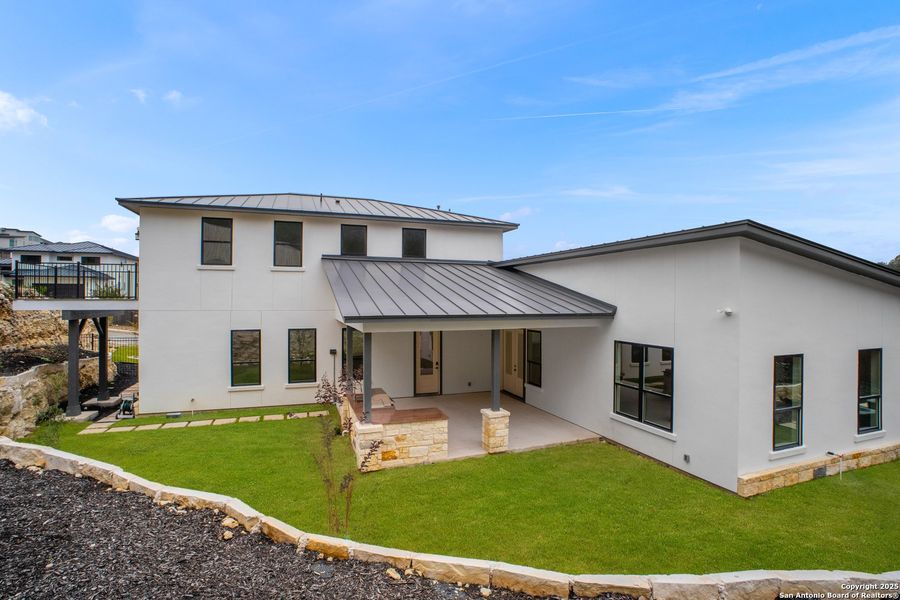 Exterior details and patio area of a home in , San Antonio (Image 7).