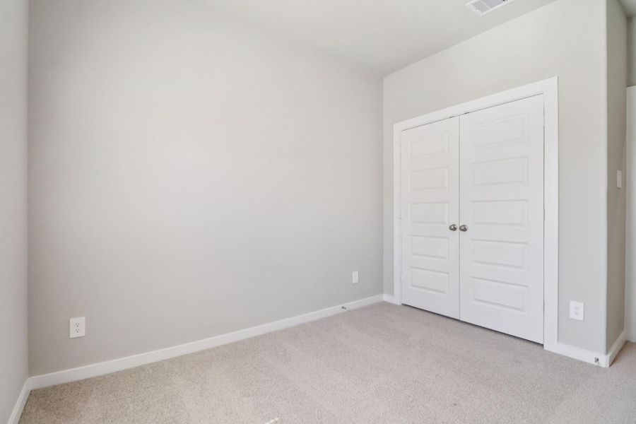 Spacious, unfurnished interior of a new home in Cole Creek Crossing, Houston (Image 27).