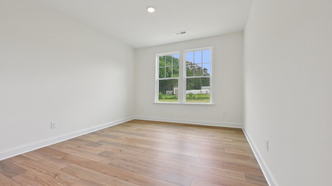 Representative furnished interior of a home built from the Stonehaven by DRB Homes in Campbell Ridge, Angier (Image 17).