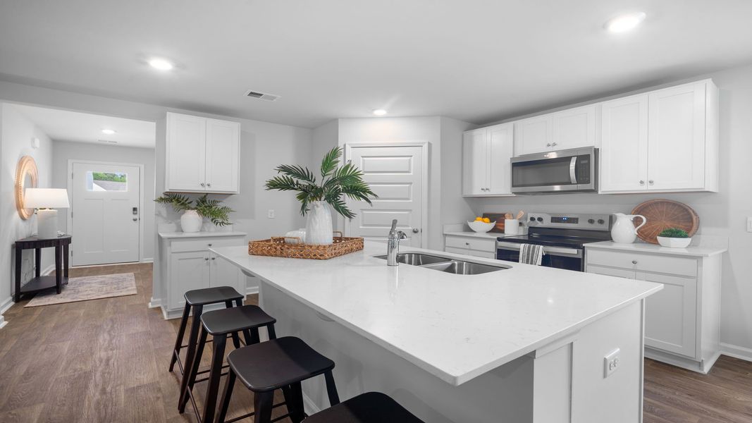 Representative furnished interior of a home built from the Hartsville by D.R. Horton in Rice Hope, Port Wentworth (Image 4).